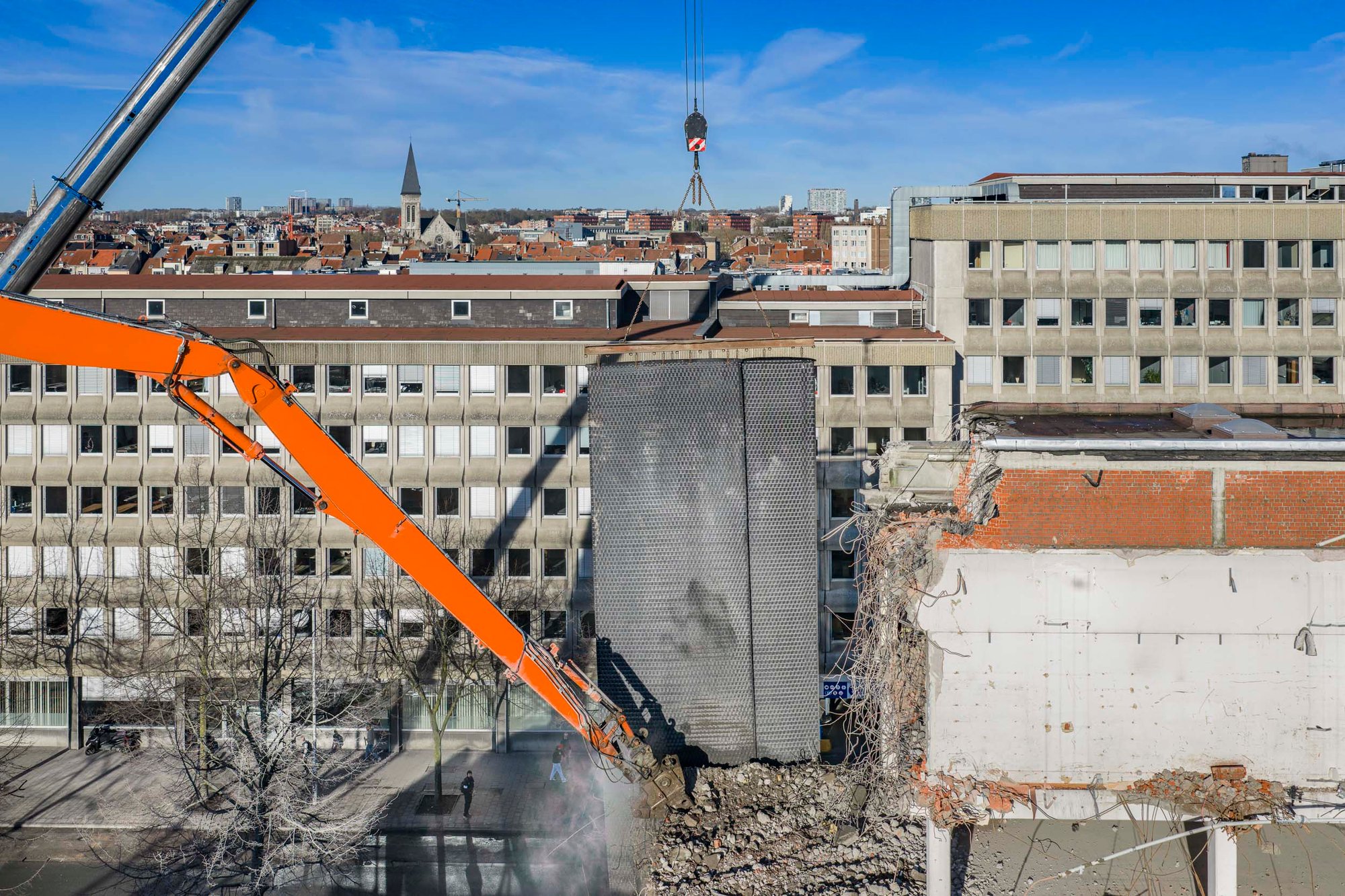 Dust curtain with zipper door at the entrance of a city-centre building
