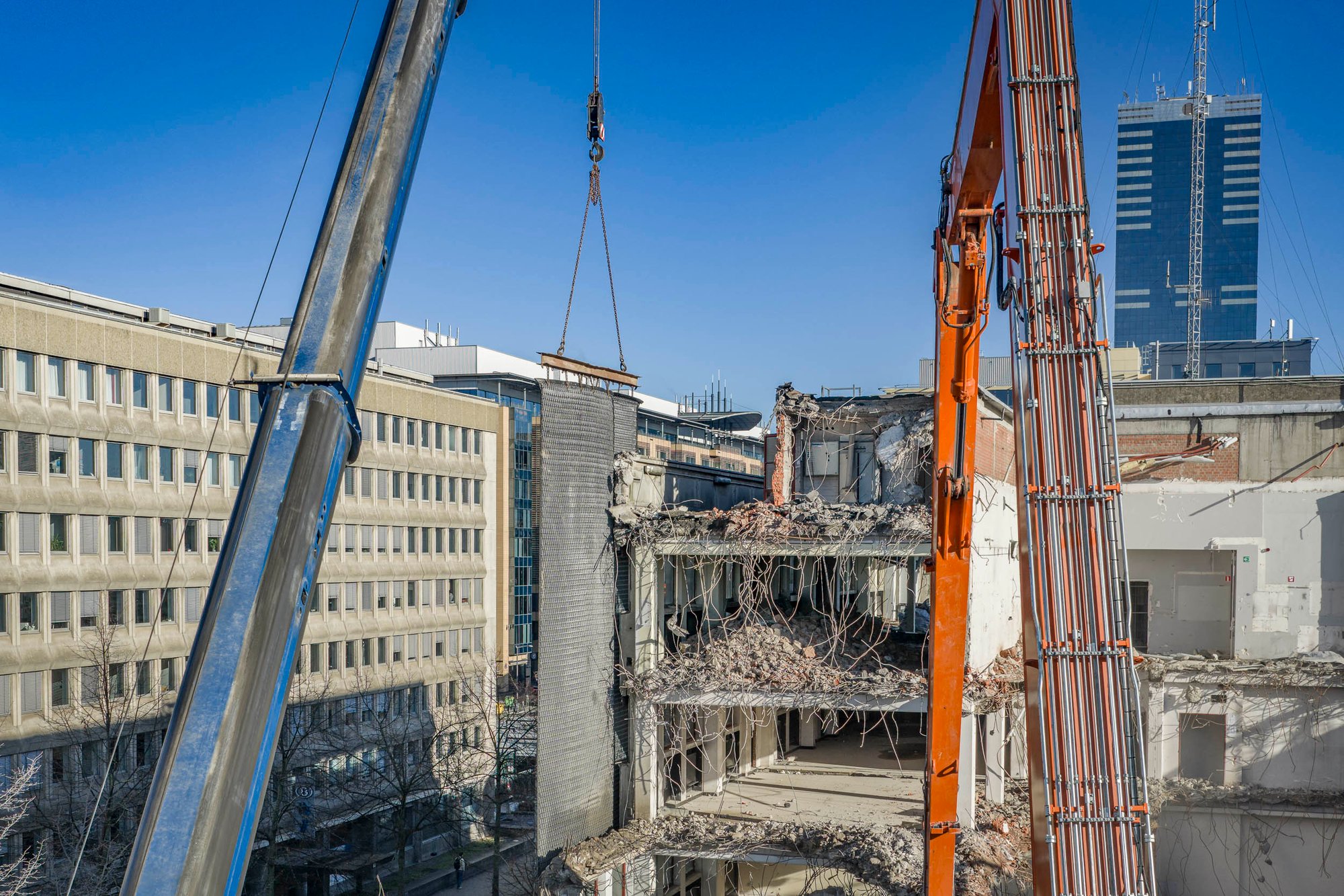 Dust curtain installed in a city-centre building entrance to contain demolition dust
